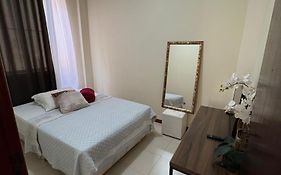 Quarto em apartamento